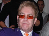 Elton John and Sam Taylor-Wood at the auction of 'Champions' photographic portraits to benefit 'The Elton John AIDS Foundation'