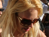 Britney Spears is issued with a parking ticket after parking illegally, while shopping at Vionnet Boutique on Robertson Boulevard.