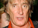 Rod Stewart leaving a restaurant in Beverly Hills after having dinner with his wife Penny Lancaster. Los Angeles, California.