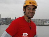 Junade Khan abseils for Christian Aid