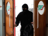 A masked man enters Relish