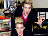 Jedward signing copies of their album