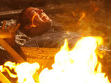 Warren trapped in the fire