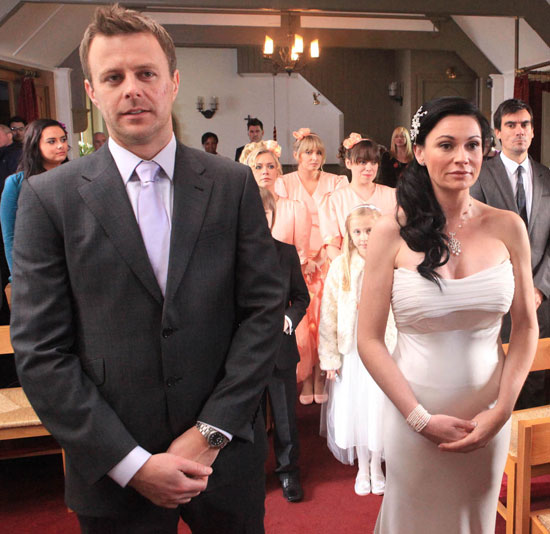 Chas walks the aisle, joining Carl.