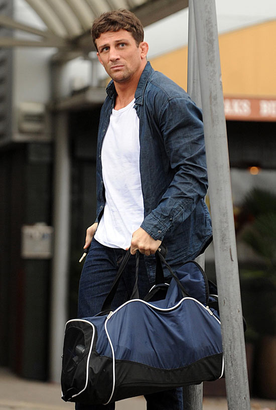 Alex packing his bags in 2011