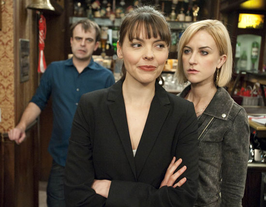 Tracy Barlow (Kate Ford) behind the bar at The Rovers with Steve McDonald (Simon Gregson) and Becky McDonald (Katherine Kelly)