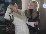 As Glenda is walking, Shirley comes out of the shadows and drags her up.