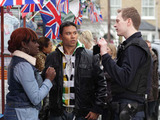 As they are talking, a man walks up and introduces himself as Daniel from the UK Border Agency.