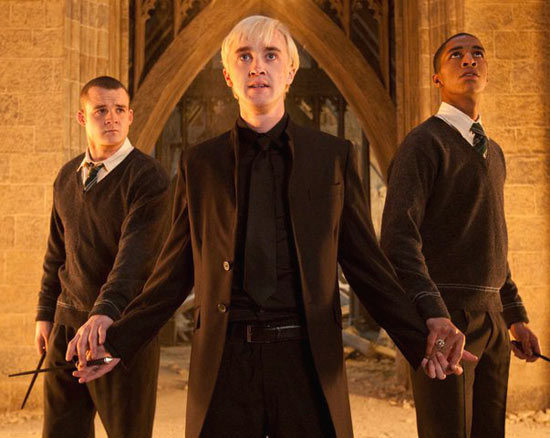 Draco Malfoy flanked by Gregory Goyle and Blaise Zabini 