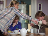 Over breakfast Ian makes Jane ask for condiments on his side of the hose, vengeful Jane accidentally pours milk into Ian's lap.