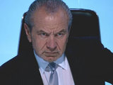 Lord Alan Sugar in The Apprentice boardroom