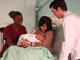 Marlon and Rhona are in tears as the baby is handed to Rhona