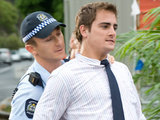 Kyle Canning is threatened by a cop