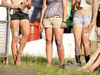 Painted legs at a festival