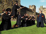 Neville Longbottom (Matthew Lewis) struggles to control his broom at Quidditch practice