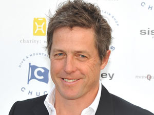 Hugh Grant attends Chucs Dive and Mountain Shop Charity Water held at the Serpentine, Hyde Park