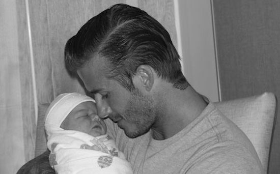 Victoria Beckham tweets picture of David and baby Harper Seven.