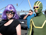 Costumed characters walk to the Comic-Con 2011 Preview Night