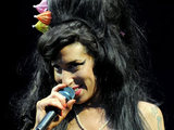 Amy Winehouse performing on the Pyramid Stage at the Glastonbury Festival 2008.