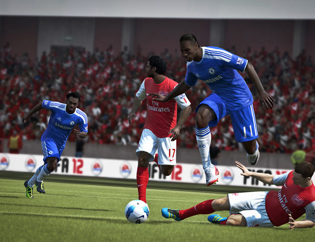 Drogba jumps a tackle