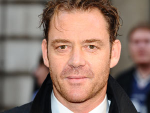 Marton Csokas struts his stuff before the premiere of the Nazi-hunting drama