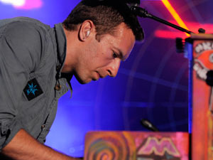 Chris Martin from Coldplay performing on stage