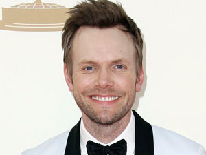 Joel McHale on the red carpet at the 63rd Primetime Emmy Awards
