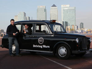 Dr James Brighton and Colin Murray unveil the world's first remote controlled black cab in London