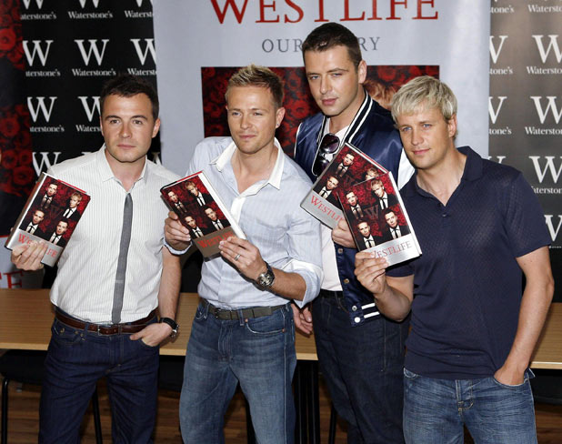 Westlife sign copies of their autobiography