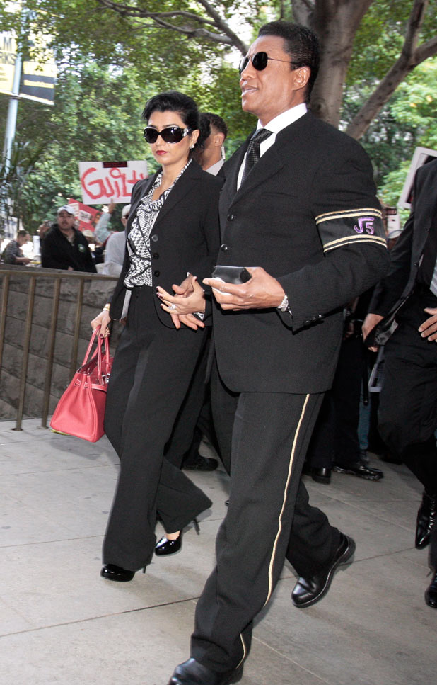 Michael Jackson's brother Jermaine Jackson and his wife Halima Rashid arrive at the courthouse after it was announced that jurors had reached a verdict