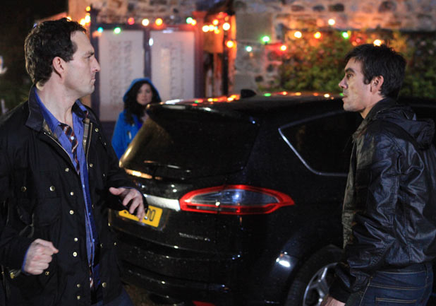 John Barton (James Thornton) punches Cain Dingle (Jeff Hordley)