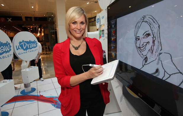 Jenni Falconer, has her caricature drawn at Westfield’s Stratford City shopping centre to launch the nationwide tour of the uDraw gaming