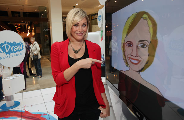 Jenni Falconer, has her caricature drawn at Westfield’s Stratford City shopping centre to launch the nationwide tour of the uDraw gaming