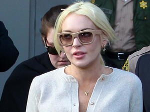 Lindsay Lohan
leaving Los Angeles County Superior Court after attending a progress report hearing, relating to her recent conviction for a probation violation. Lohan was given top marks for her efforts by the judge
Los Angeles