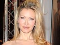 The model is reportedly worried that her large breasts will make diving tricky.
