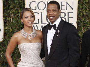 Beyonce, left, is joined by husband Jay-Z, as she arrives at the 66th Annual Golden Globe Awards on Sunday, Jan. 11, 2009, in Beverly Hills, Calif