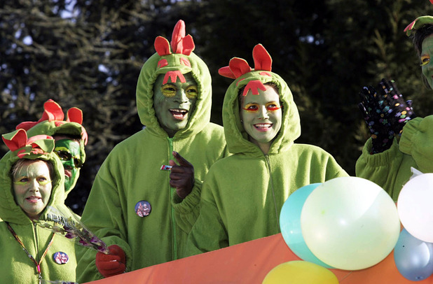 Wearing dragon costumes