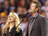 Blake Shelton, right, and Miranda Lambert sing "America the Beautiful" before the NFL Super Bowl XLVI