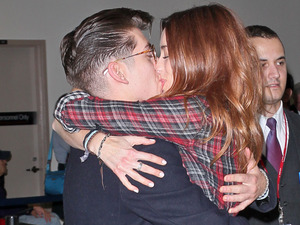 Arctic Monkeys star Alex Turner engages in a very public display of affection with a beautiful redhead as he arrives at LAX Airport. The mystery woman planted a big kiss on the rocker after jumping into his arms and wrapping her legs around him after he entered the arrivals hall. Turner split from TV personality Alexa Chung in 2011
Los Angeles, California