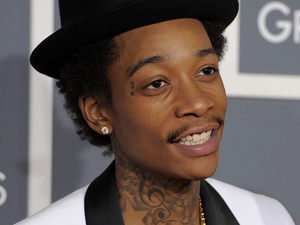 The 54th Annual Grammy Awards: Red Carpet: Wiz Khalifa with girlfriend Amber Rose