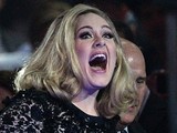 Adele collects the MasterCard British Album of the Year award on stage during the 2012 Brit awards at The O2 Arena, London