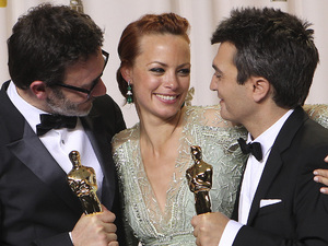 Michel Hazanavicius, Berenice Bejo and Thomas Langmann during the Oscars 2012