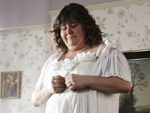 Heather is dismayed when tries on the second hand dress.