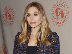 Elizabeth Olsen wearing a Chanel jacket and a 'The Row' dress (her sisters fashion label).
The Atlantic Theater Company Spring Gala held at The Lighthouse at Chelsea Piers - Arrivals.
New York City, USA