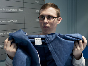The forensic team begin taking away everyone's clothes.