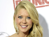 Actress Tara Reid from the cast of the movie "American Reunion" poses for photos before the Australian premiere in Melbourne