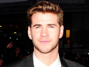 Liam Hemsworth arrives at the premiere of The Hunger Games at the O2 in London.