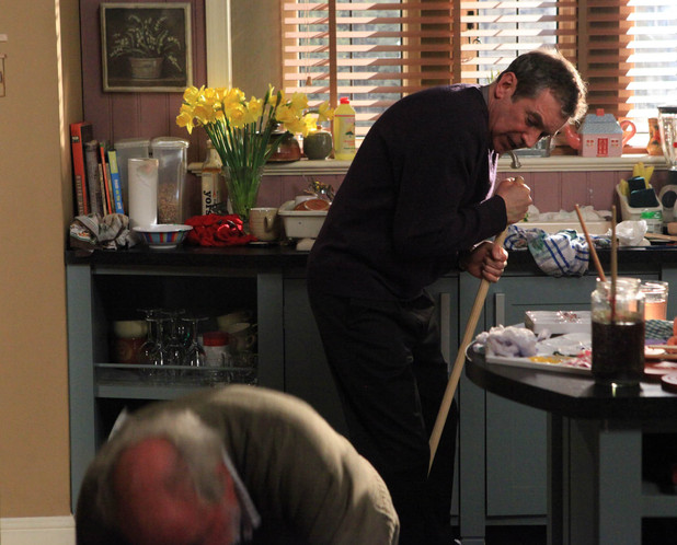 Ashley pushes Sandy when he makes a grab for the mop, causing Sandy to slip over and injure himself