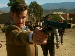 The Doctor pulls a gun in the Dcotor Who season 7 first look trailer