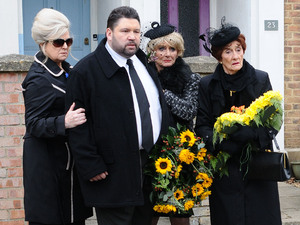 Billy and Phil try to hold Shirley back when she sees Andrew.